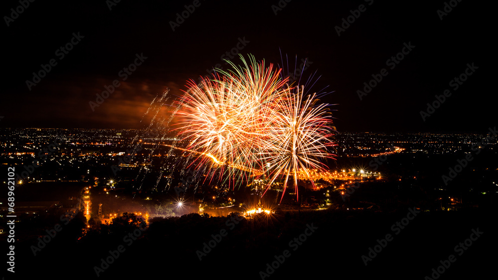 Fireworks in night cityscape.