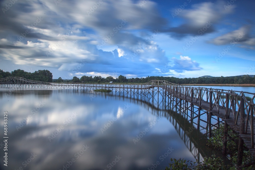 Wooden bridge crossover reservoir southern of Thailand