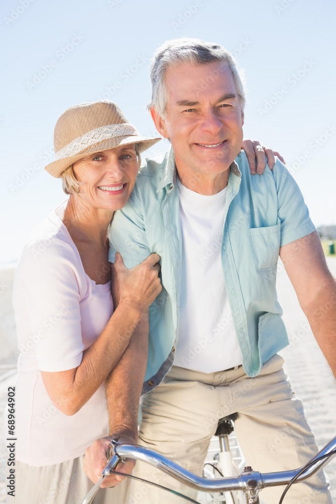 Fototapeta premium Happy senior couple going for a bike ride