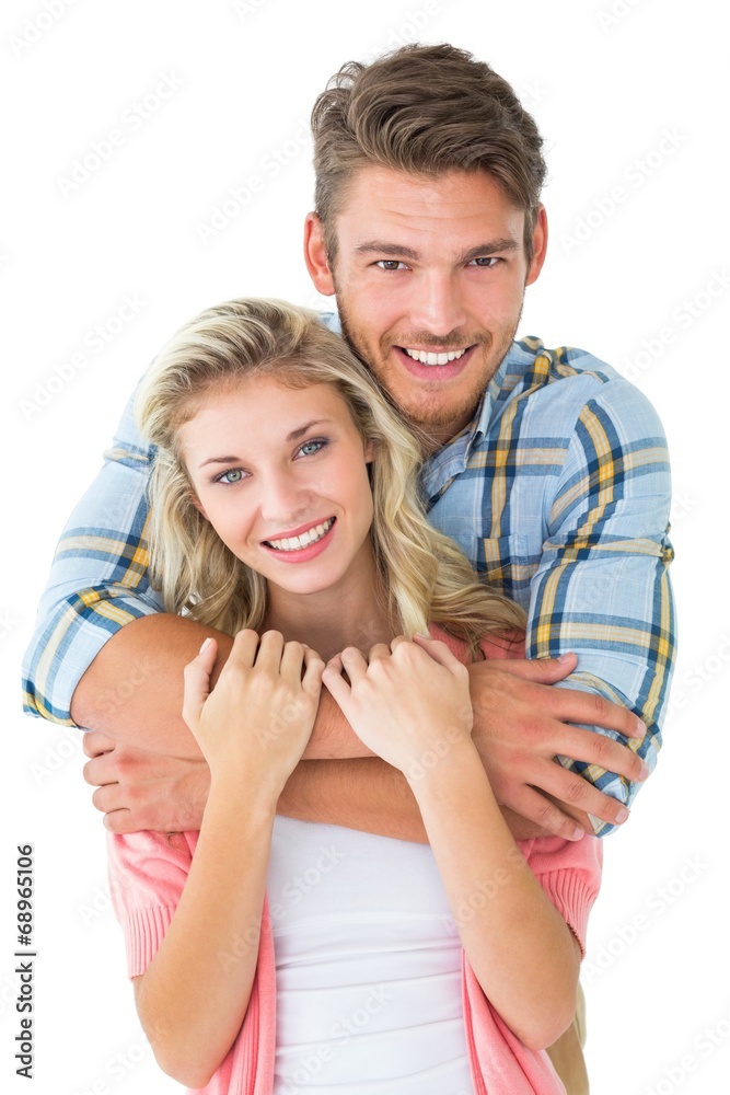 Attractive young couple smiling at camera