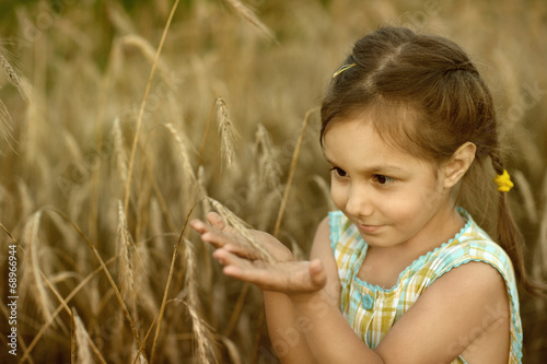 Girl in wheat field