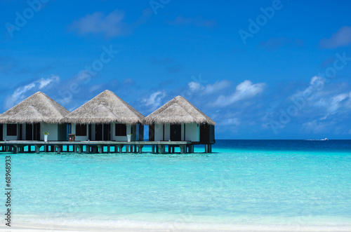 Beautiful beach with water bungalows at Maldives