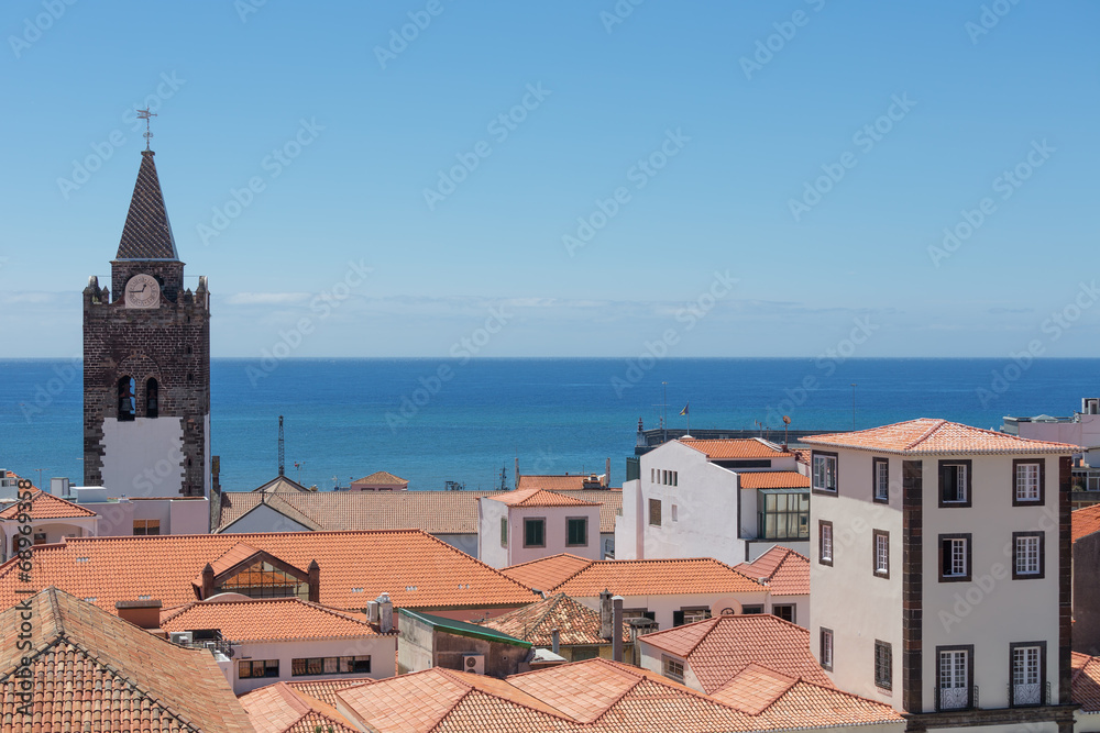 Aerial view roofs of Funchal with cathedral tower, Madeira