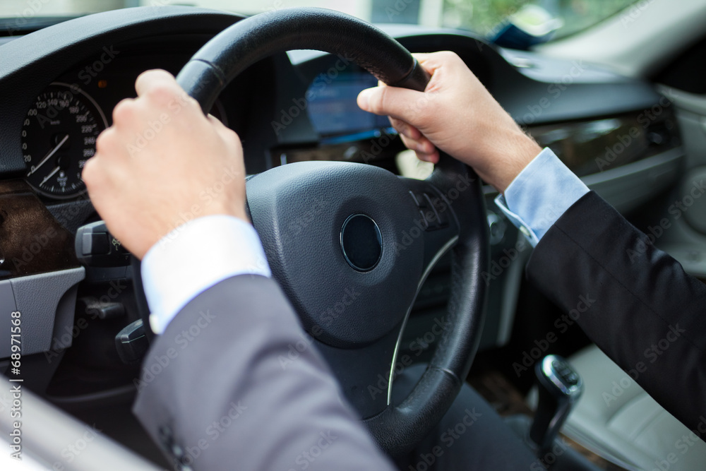 Man driving his car