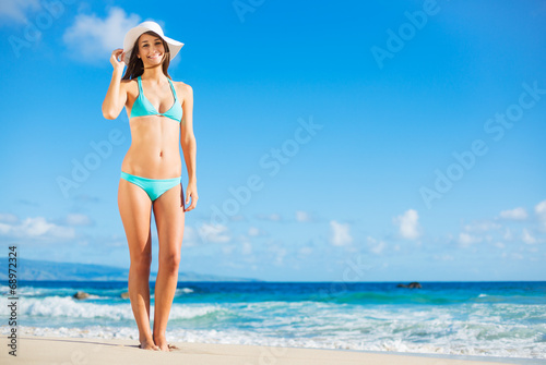 Beautiful Young Woman on the Beach