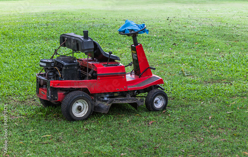 Lawn mower on grass in the park