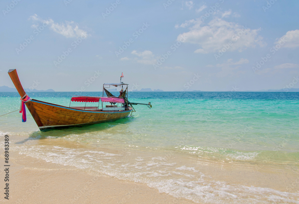 long tail boats in Tropical beach, Andaman Sea. long tail boats in Tropical beach, Andaman Sea.