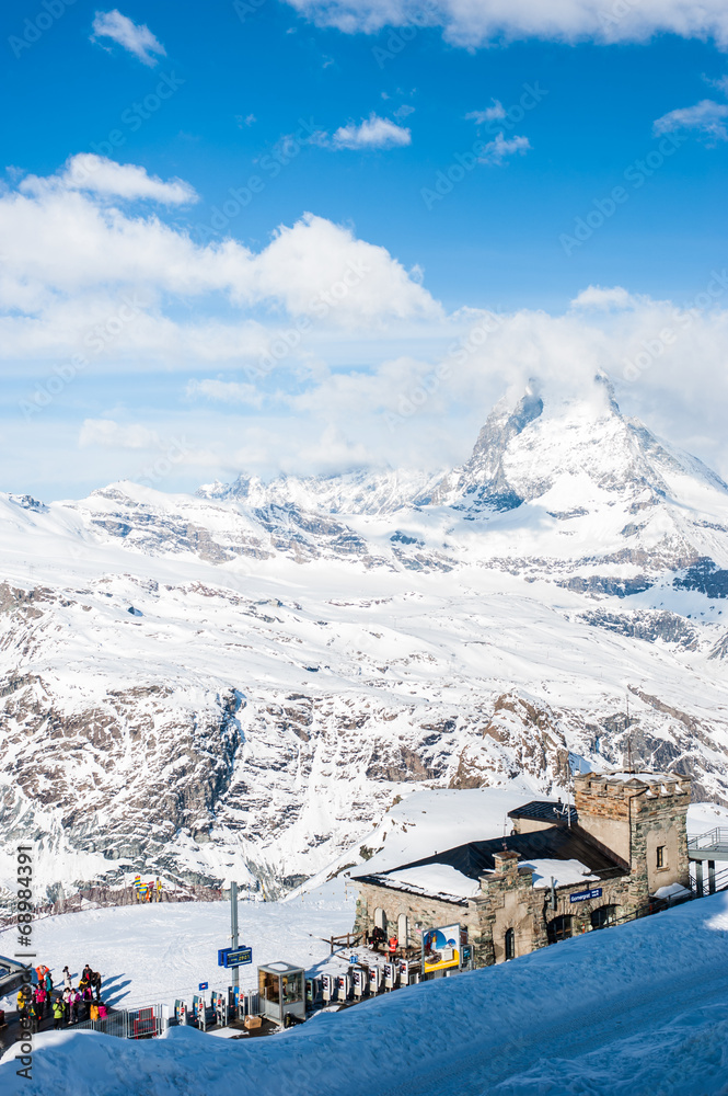 Matterhorn view with station cloud and blue sky