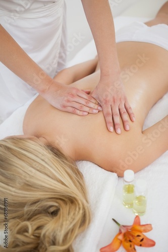 Blonde enjoying a back massage