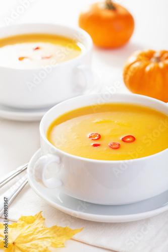 pumpkin soup in white bowl