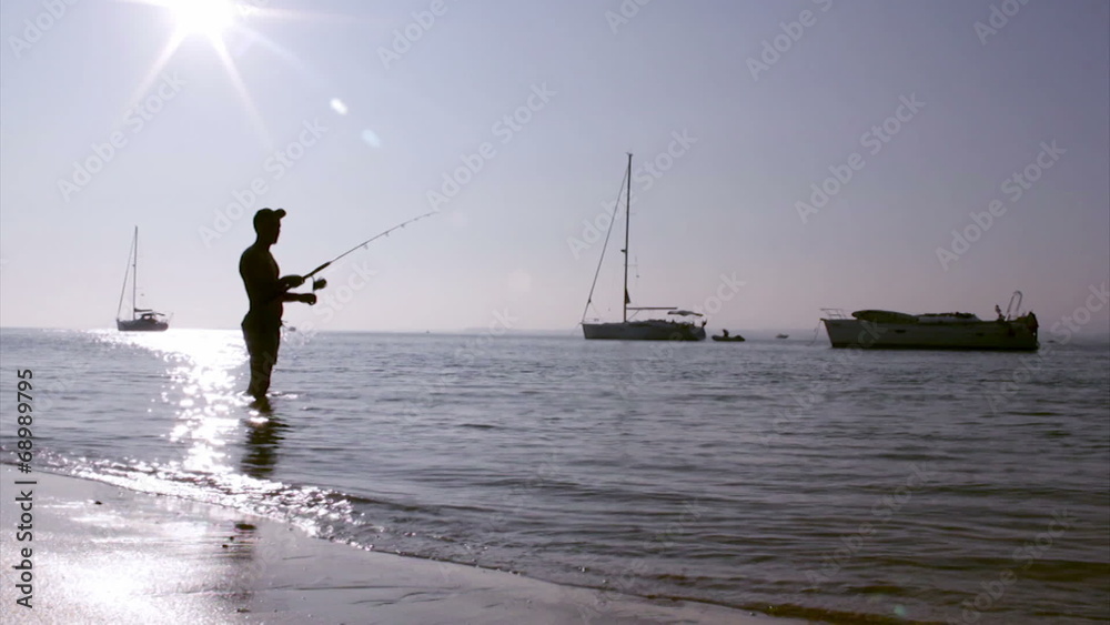 Fisherman silhouette at Ria Formosa, Algarve. Fisherman silhouette at Ria Formosa, Algarve.