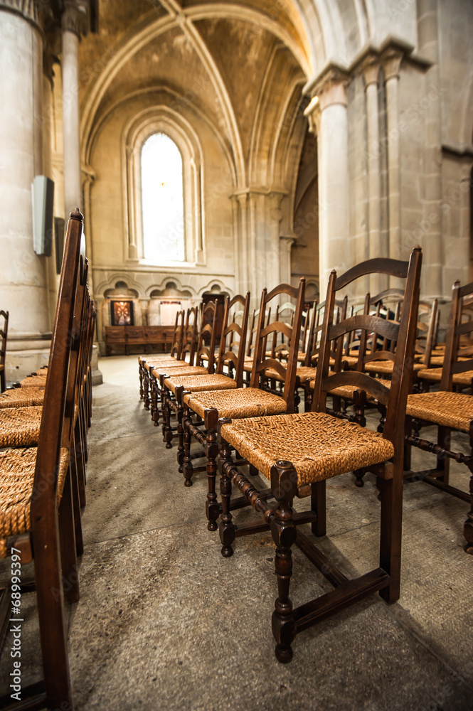 Fototapeta premium Chairs In side of Notre-Dame Cathedral - Lausanne, Switzerland
