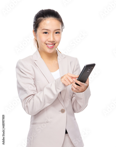 Businesswoman use mobile phone © leungchopan