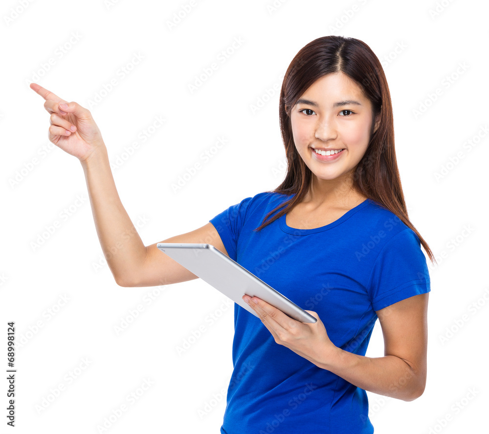 Asian woman with digital tablet and finger point aside Asian woman with digital tablet and finger point aside