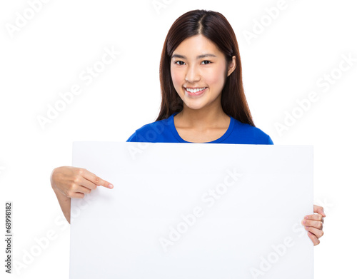 Woman finger point to the blank board
