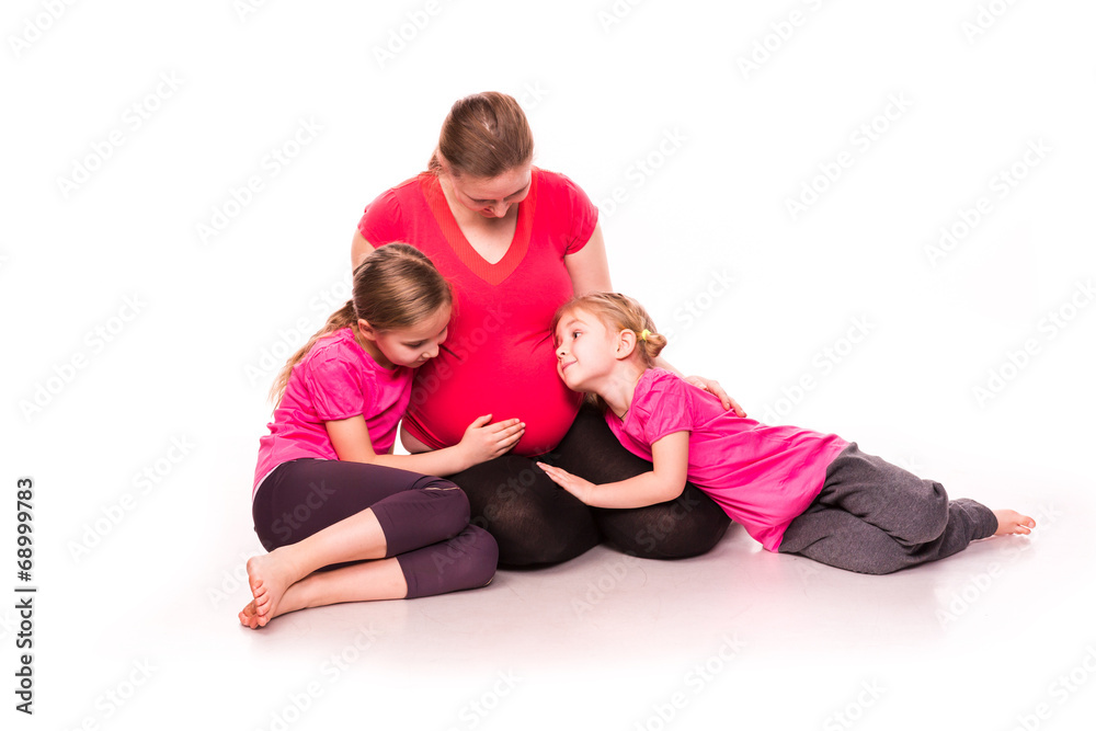 Pregnant woman with kids exercising isolated Pregnant woman with kids exercising isolated