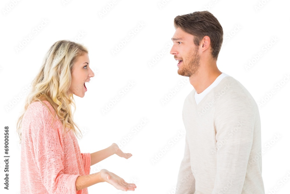 Attractive couple talking about something shocking Attractive couple talking about something shocking