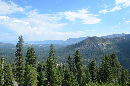 view through pines from Echo summit on Sierra Nevada and Tahoe © lembrechtsjonas