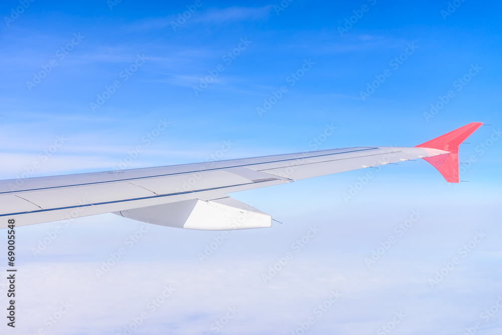 Looking through window aircraft during flight in wing with a nic Looking through window aircraft during flight in wing with a nic