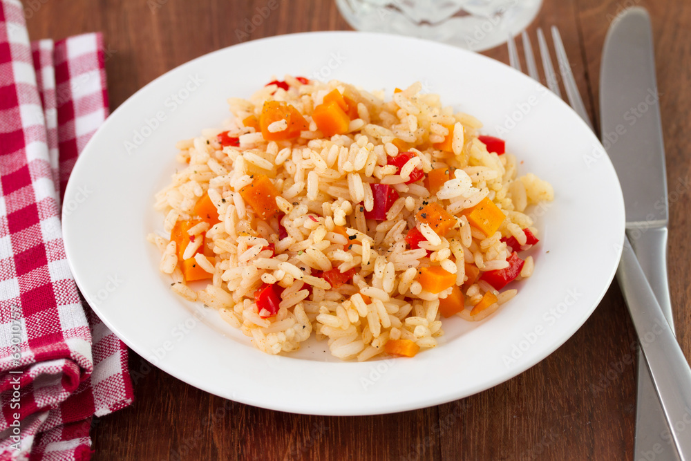 rice with vegetables on plate rice with vegetables on plate