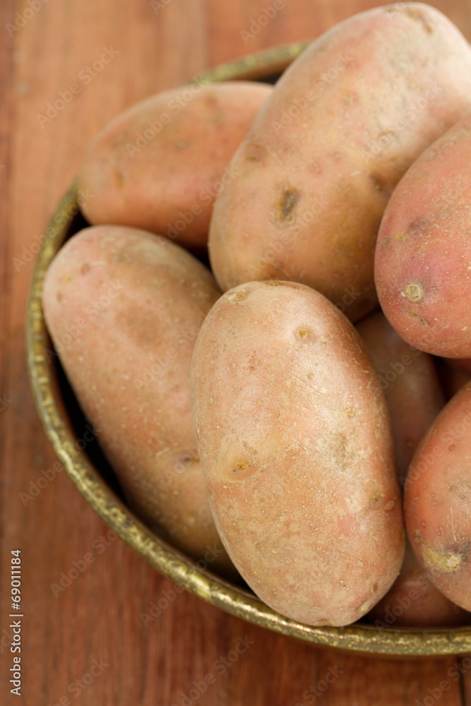 potato in dish on dark background potato in dish on dark background
