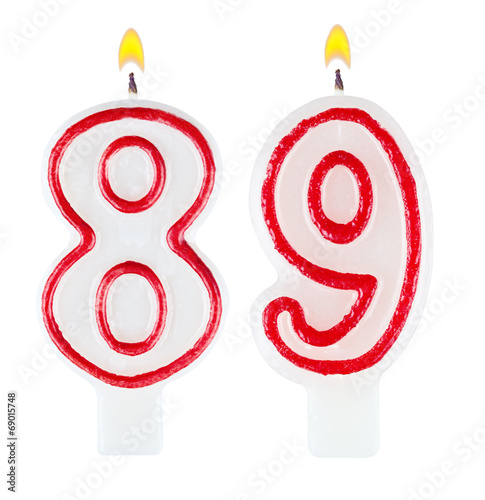 Birthday candles number eighty nine isolated on white background photo