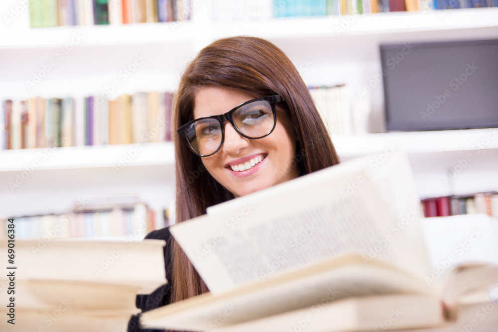 pretty female student with glasses smiling pretty female student with glasses smiling