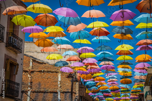 Obraz na płótnie Street decorated with colored umbrellas,Madrid w salonie
