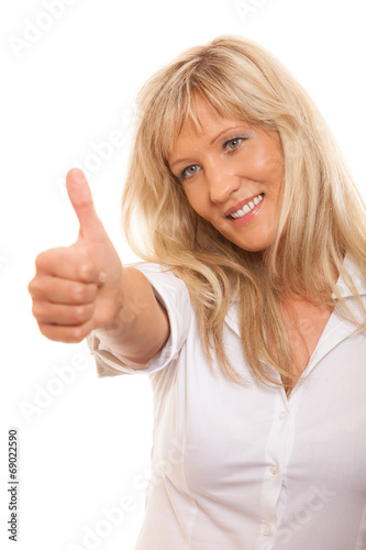 Mature woman giving thumbs up sign isolated