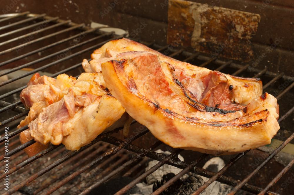 Pork on grill for grilling. Pork on grill for grilling.
