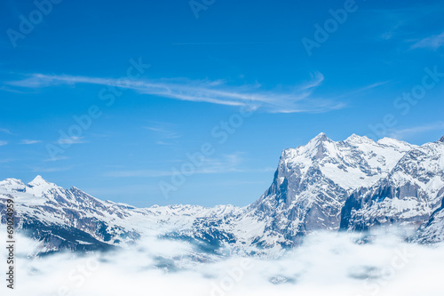 Snow Mountain Range Landscape with Blue Sky from Jungfrau Region © stnazkul