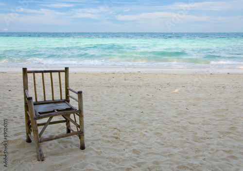Old Bamboo Chair on beach