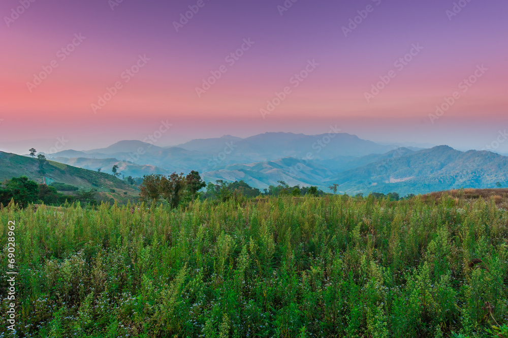 Landscape scene of mountain at dawn with beautiful sunset sky