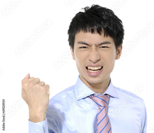 Angry screaming business man hand gesturing fist-close up