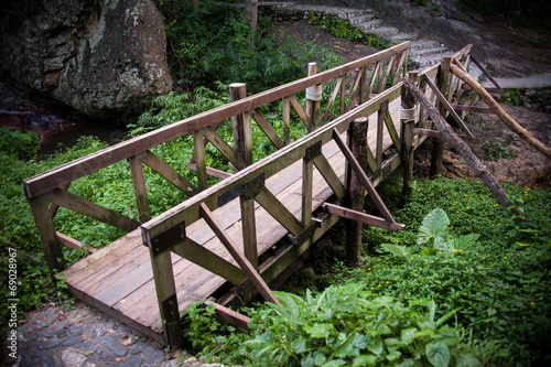 Old wood bridge in a park