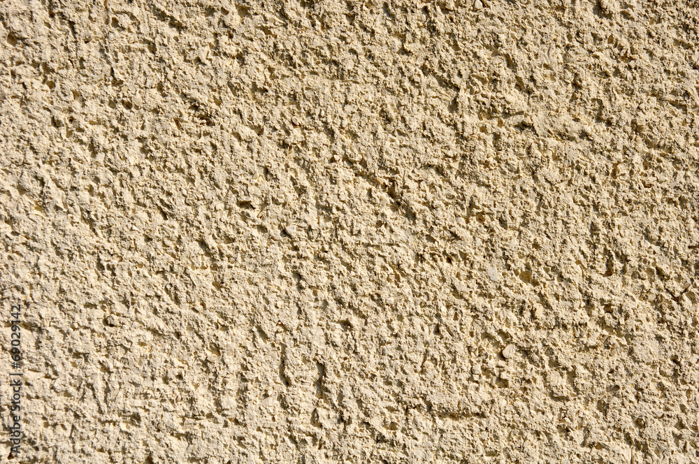 custom made wallpaper toronto digitalLight yellow rough plaster on wall closeup