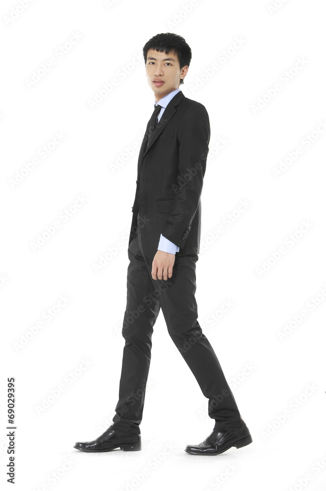 Portrait of a handsome young business man walking Portrait of a handsome young business man walking