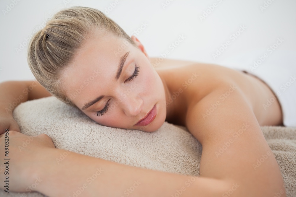 Beautiful blonde relaxing on massage table Beautiful blonde relaxing on massage table