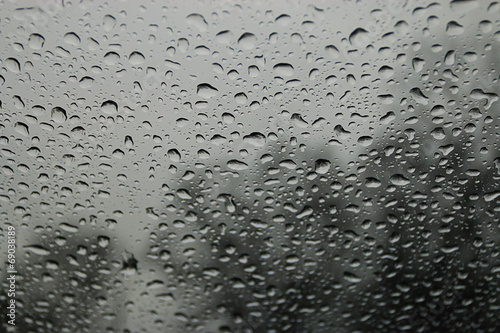 drops on the glass window texture street rain