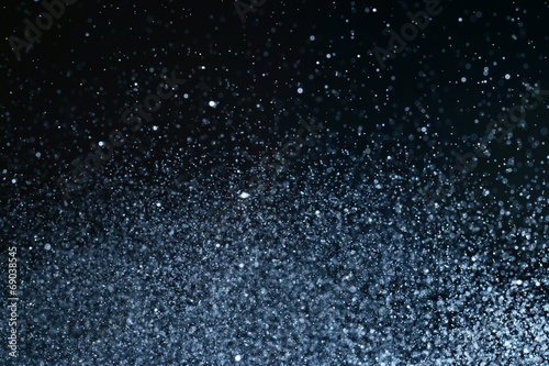 texture blurred bokeh drops on a black background