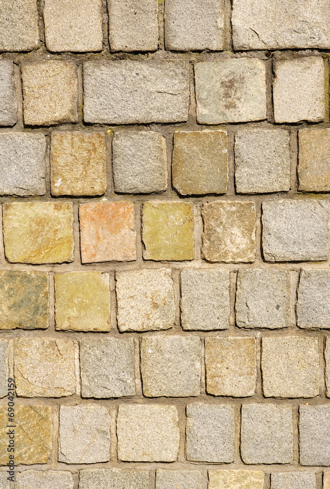 Obraz premium Colorful stone wall closeup