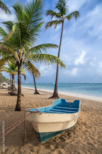 boat on sandy Tropical Caribbean beach