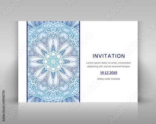 White invitation with floral decoration.
