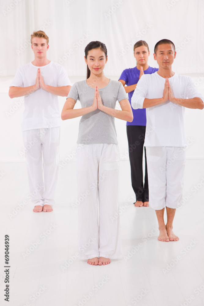 Multi ethnic group of happy people doing yoga Multi ethnic group of happy people doing yoga