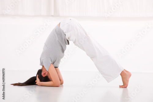 Fitness woman in the bridge position