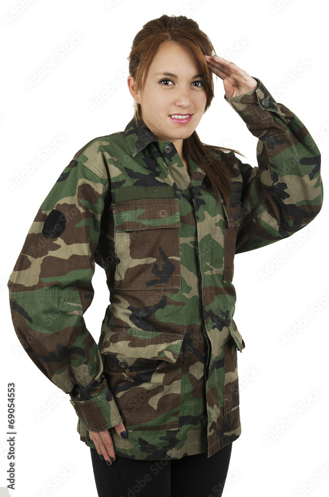 Happy teenage young girl wearing green military jacket Happy teenage young girl wearing green military jacket