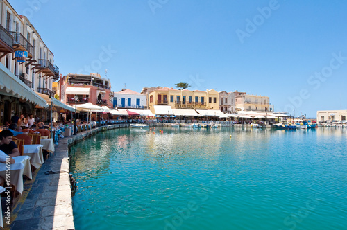 The venetian harbour with bars and restaurants. Crete, Greece.