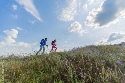 Young couple hiking on the ...