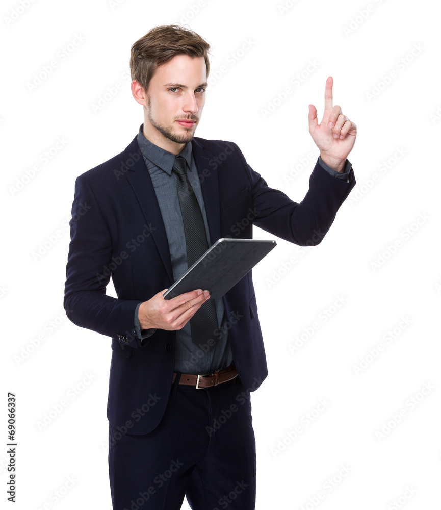 Businessman with digital tablet and finger up Businessman with digital tablet and finger up