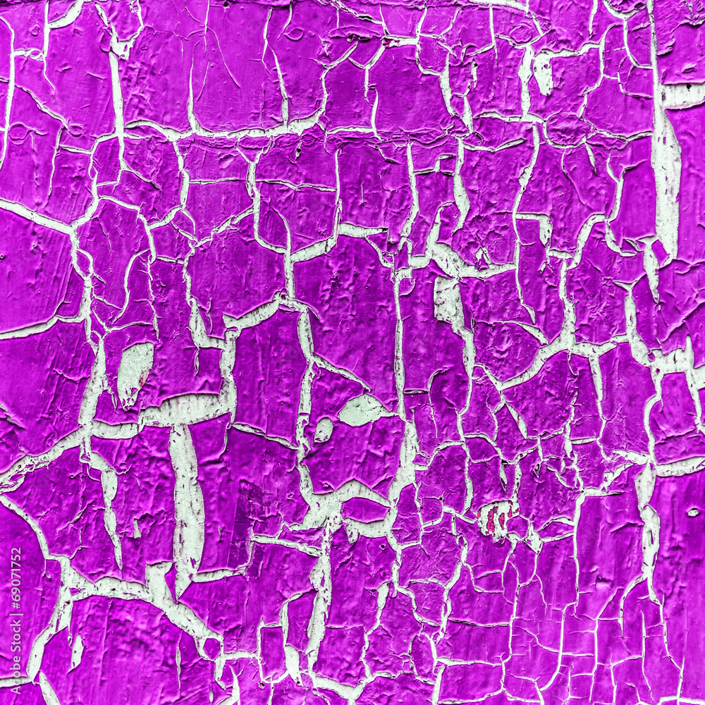 cracked paint on the concrete wall cracked paint on the concrete wall